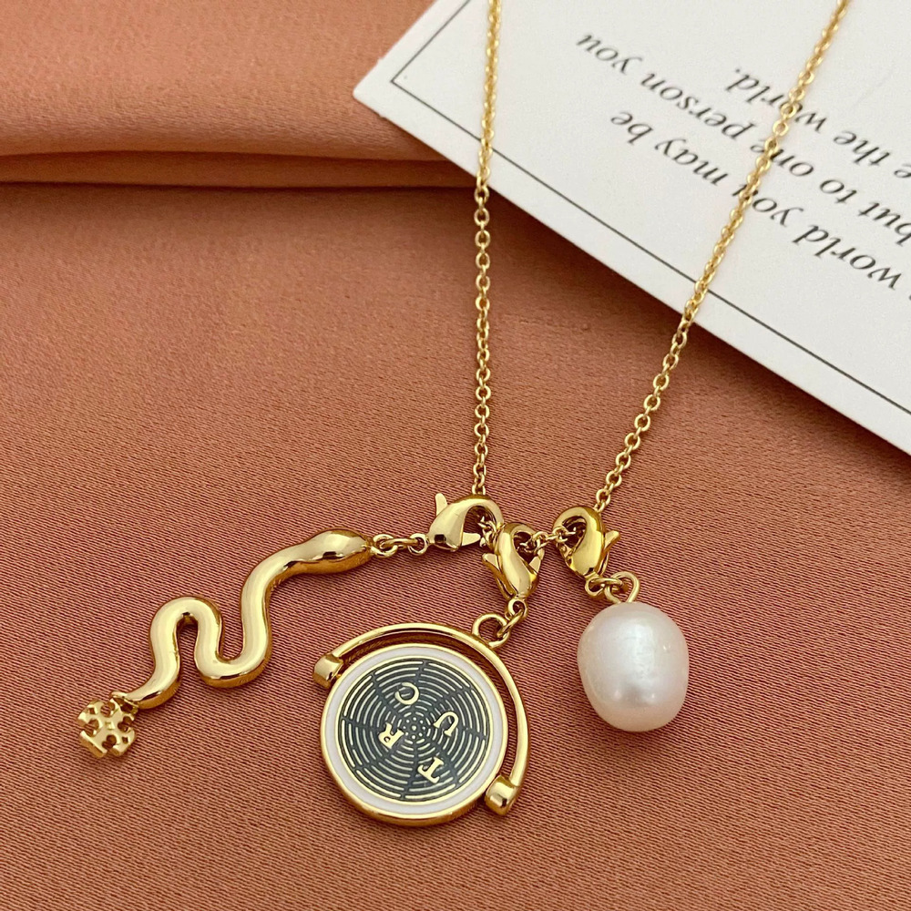 Tory Burch Freshwater Pearl Rotating Disc Detachable Snake Pendant Necklace